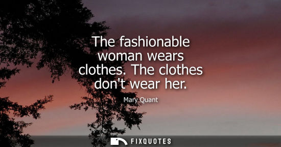 Small: The fashionable woman wears clothes. The clothes dont wear her